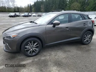 2017 Mazda CX-3 Touring with VIN JM1DKFC79H0148103, listed as a Copart auction lot 51343025 with 79,765 mi miles and Salvage Title. Bid and sale history available at carsss.com. Image 1.