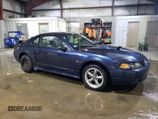 2001 Ford Mustang GT Deluxe with VIN 1FAFP42X61F186011, listed as a Copart auction lot 43812845 with 96,864 mi miles and Salvage Title. Bid and sale history available at carsss.com. Image 4.