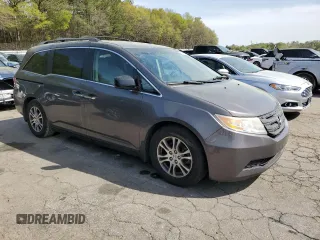 2011 Honda Odyssey EX-L with VIN 5FNRL5H63BB067278, listed as a Copart auction lot 51147855 with 240,414 mi miles and Salvage Title. Bid and sale history available at DreamBid. Image 4.