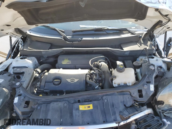 2014 MINI Countryman S with VIN WMWZC3C53EWP52333, listed as a Copart auction lot 54418495 with 34,687 mi miles and Salvage Title. Bid and sale history available at DreamBid. Image 11.