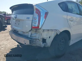 2015 Toyota Prius Four z VIN JTDKN3DU9F1875847, wystawiony jako IAAI lot #41937117 z przebiegiem 150 735 mil mil oraz . Historia ofert i sprzedaży dostępna na DreamBid. Obrazek 19.