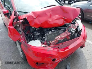 2016 Honda Fit LX with VIN JHMGK5H59GS008911, listed as a IAAI auction lot 42002981 with 96,224 mi miles and . Bid and sale history available at DreamBid. Image 6.