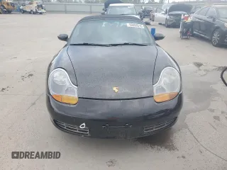 1998 Porsche Boxster с VIN WP0CA2982WU620882, выставлен на аукционе Copart как лот 50950515 с пробегом Не указан миль и Списание • Salvage title. История ставок и продаж доступна на DreamBid. Изображение 5.