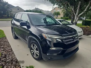 2018 Honda Pilot EX-L with VIN 5FNYF5H59JB001424, listed as a Copart auction lot 63143615 with 130,939 mi miles and Clean title. Bid and sale history available at DreamBid. Image 1.