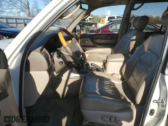 2002 Lexus LX 470 z VIN JTJHT00W123521886, wystawiony jako Copart lot #49223485 z przebiegiem 190 398 mil mil oraz Czysty tytuł • Clean title. Historia ofert i sprzedaży dostępna na DreamBid. Obrazek 7.