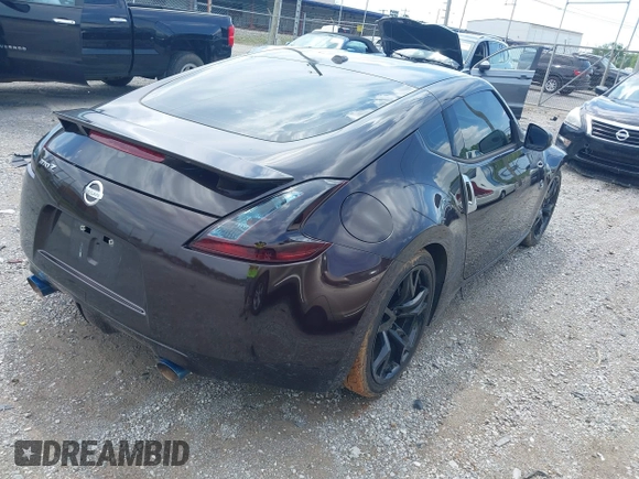 2010 Nissan 370Z Touring with VIN JN1AZ4EH9AM504673, listed as a IAAI auction lot 42284934 with 132,177 mi miles and . Bid and sale history available at DreamBid. Image 4.