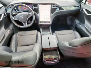 2017 Tesla Model S 60 с VIN 5YJSA1E11HF231340, выставлен на аукционе Copart как лот 62087375 с пробегом 74 303 миль миль и Списание • Salvage title. История ставок и продаж доступна на DreamBid. Изображение 8.