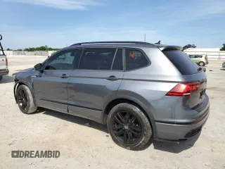 2022 Volkswagen Tiguan SE R-Line Black with VIN 3VVCB7AX6NM081880, listed as a Copart auction lot 54102735 with 52,010 mi miles and Salvage Title. Bid and sale history available at DreamBid. Image 2.