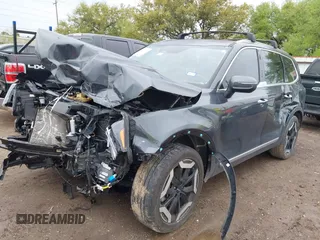 2023 Kia Telluride S with VIN 5XYP6DGC7PG339945, listed as a IAAI auction lot 41903398 with 25,072 mi miles and . Bid and sale history available at DreamBid. Image 2.
