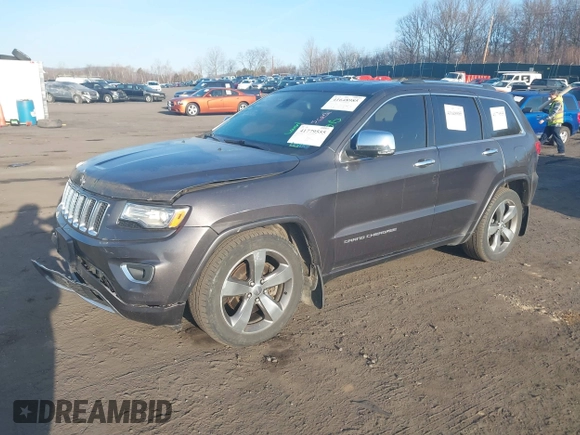 2015 Jeep Grand Cherokee Overland with VIN 1C4RJFCT3FC725239, listed as a IAAI auction lot 41779555 with 100,837 mi miles. Bid and sale history available at carsss.com. Image 17.