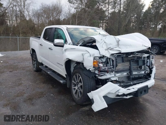 2021 GMC Canyon 4WD Denali with VIN 1GTG6EEN6M1240894, listed as a IAAI auction lot 41387786 with 73,323 mi miles. Bid and sale history available at carsss.com. Image 1.