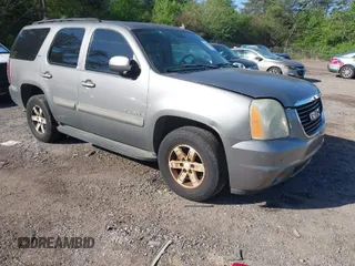 2007 GMC Yukon SLT with VIN 1GKFC13J57J103418, listed as a IAAI auction lot 41955682 with 318,338 mi miles. Bid and sale history available at carsss.com. Image 1.