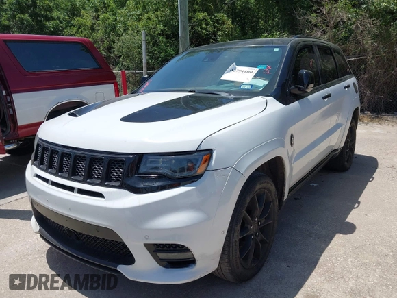 2015 Jeep Grand Cherokee Summit с VIN 1C4RJFJTXFC173287, выставлен на аукционе IAAI как лот 42794100 с пробегом 125 705 миль миль и . История ставок и продаж доступна на DreamBid. Изображение 17.
