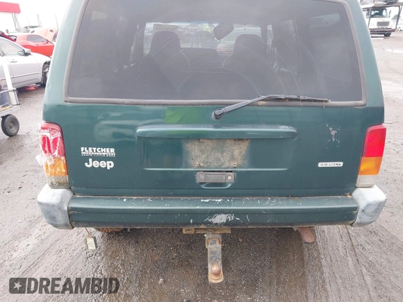 2000 Jeep Cherokee with VIN 1J4FT48S4YL240347, listed as a IAAI auction lot 42361311 with Not provided miles and . Bid and sale history available at DreamBid. Image 13.