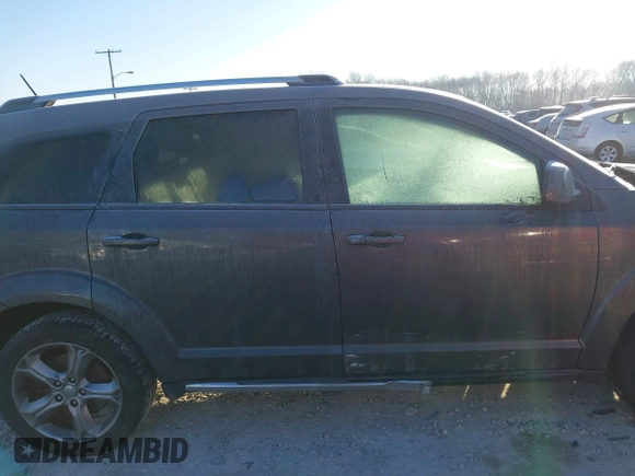 2016 Dodge Journey Crossroad Plus z VIN 3C4PDCGB0GT165975, wystawiony jako IAAI lot #41368904 z przebiegiem 101 835 mil mil oraz . Historia ofert i sprzedaży dostępna na DreamBid. Obrazek 13.