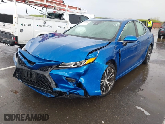 2019 Toyota Camry LE z VIN 4T1B11HK1KU282870, wystawiony jako IAAI lot #41799625 z przebiegiem 63 977 mil mil oraz . Historia ofert i sprzedaży dostępna na DreamBid. Obrazek 2.