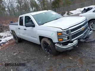 2014 Chevrolet Silverado 1500 Work Truck with VIN 1GCVKPEH9EZ305099, listed as a IAAI auction lot 41740048 with 212,886 mi miles and . Bid and sale history available at DreamBid. Image 1.