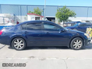 2004 Nissan Maxima SL with VIN 1N4BA41E64C861846, listed as a IAAI auction lot 41911687 with 218,668 mi miles. Bid and sale history available at carsss.com. Image 13.