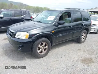 2005 Mazda Tribute S with VIN 4F2CZ96185KM16560, listed as a IAAI auction lot 42065748 with 84,584 mi miles and . Bid and sale history available at carsss.com. Image 2.