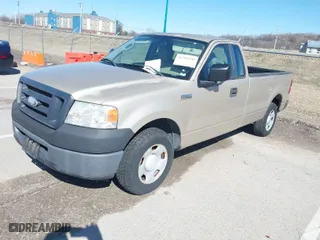 2007 Ford F-150 XL with VIN 1FTRF12257KB14262, listed as a IAAI auction lot 41709350 with 121,816 mi miles. Bid and sale history available at carsss.com. Image 2.