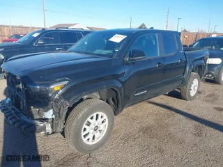 2024 Toyota Tacoma 2WD SR5 with VIN 3TMKB5FN0RM011416, listed as a IAAI auction lot 41303796 with 9,923 mi miles. Bid and sale history available at carsss.com. Image 19.