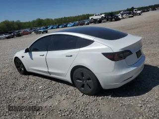 2023 Tesla Model 3 with VIN 5YJ3E1EA3PF602067, listed as a Copart auction lot 52317695 with 54,867 mi miles and Salvage Title. Bid and sale history available at DreamBid. Image 2.