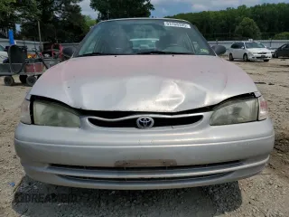 1999 Toyota Corolla VE with VIN 2T1BR12E4XC253867, listed as a Copart auction lot 63768395 with 164,195 mi miles and Salvage title. Bid and sale history available at DreamBid. Image 5.