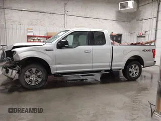2015 Ford F-150 XLT z VIN 1FTEX1EP7FKE12930, wystawiony jako IAAI lot #42321898 z przebiegiem 59 012 mil mil oraz . Historia ofert i sprzedaży dostępna na DreamBid. Obrazek 14.