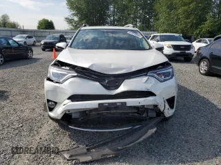 2016 Toyota RAV4 Limited with VIN JTMDFREV9GJ066429, listed as a Copart auction lot 61874995 with 77,686 mi miles and Salvage title. Bid and sale history available at DreamBid. Image 5.