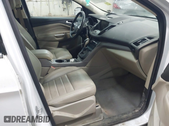 2014 Ford Escape SE with VIN 1FMCU9G99EUC15477, listed as a IAAI auction lot 42147162 with 98,886 mi miles and . Bid and sale history available at DreamBid. Image 5.