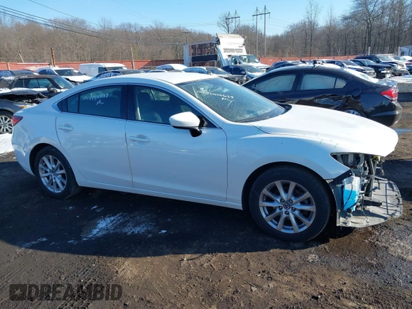 2015 Mazda 6 i Sport with VIN JM1GJ1U64F1171840, listed as a IAAI auction lot 41410088 with 129,691 mi miles and . Bid and sale history available at DreamBid. Image 14.