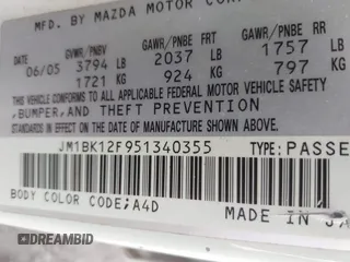 2005 Mazda 3 i with VIN JM1BK12F951340355, listed as a IAAI auction lot 41997844 with 188,991 mi miles and . Bid and sale history available at DreamBid. Image 9.