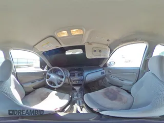 2005 Nissan Sentra S z VIN 3N1CB51D35L548576, wystawiony jako Copart lot #57654175 z przebiegiem 146 193 mil mil oraz Szkoda całkowita • Salvage title. Historia ofert i sprzedaży dostępna na DreamBid. Obrazek 14.