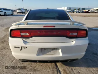 2013 Dodge Charger SXT with VIN 2C3CDXHG4DH709127, listed as a Copart auction lot 73497904 with 61,866 mi miles and Salvage Title. Bid and sale history available at carsss.com. Image 6.