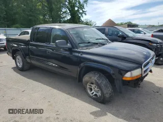2002 Dodge Dakota Sport с VIN 1B7HL38X02S720595, выставлен на аукционе Copart как лот 57847915 с пробегом 200 618 миль миль и Списание • Salvage title. История ставок и продаж доступна на DreamBid. Изображение 4.