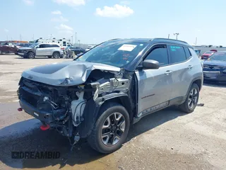 2018 Jeep Compass Trailhawk with VIN 3C4NJDDB2JT198784, listed as a IAAI auction lot 42405539 with 121,553 mi miles and . Bid and sale history available at DreamBid. Image 6.