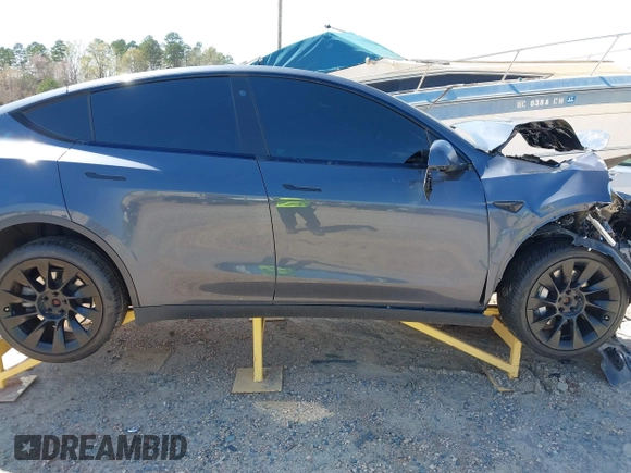 2022 Tesla Model Y Long Range with VIN 7SAYGDEE0NF387512, listed as a IAAI auction lot 41850901 with Not Provided miles and . Bid and sale history available at carsss.com. Image 13.