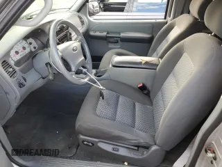 2003 Ford Explorer Sport XLS z VIN 1FMZU70E53UB36259, wystawiony jako Copart lot #73843824 z przebiegiem 124 362 mil mil oraz Nie do naprawy • Non repairable. Historia ofert i sprzedaży dostępna na DreamBid. Obrazek 7.