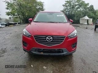 2016 Mazda CX-5 Grand Touring with VIN JM3KE4DY3G0713283, listed as a Copart auction lot 73346194 with 135,382 mi miles and Salvage Title. Bid and sale history available at carsss.com. Image 12.