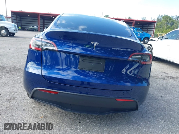 2025 Tesla Model Y Long Range z VIN 7SAYGDED0SF256650, wystawiony jako IAAI lot #41993206 z przebiegiem Nie podano mil oraz . Historia ofert i sprzedaży dostępna na DreamBid. Obrazek 16.