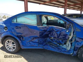 2012 Chevrolet Sonic LT with VIN 1G1JC5SH1C4184320, listed as a IAAI auction lot 42101145 with 207,735 mi miles and . Bid and sale history available at DreamBid. Image 12.