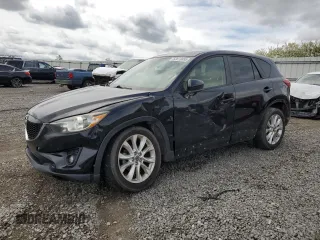 2014 Mazda CX-5 Grand Touring with VIN JM3KE4DY3E0304908, listed as a Copart auction lot 53873655 with 144,382 mi miles and Salvage Title. Bid and sale history available at DreamBid. Image 1.