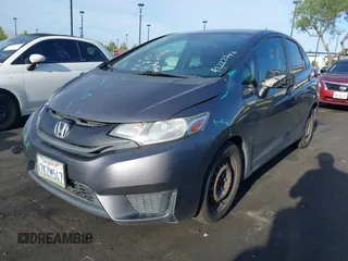 2015 Honda Fit LX z VIN 3HGGK5H51FM774707, wystawiony jako IAAI lot #42228746 z przebiegiem 238 489 mil mil oraz . Historia ofert i sprzedaży dostępna na DreamBid. Obrazek 2.