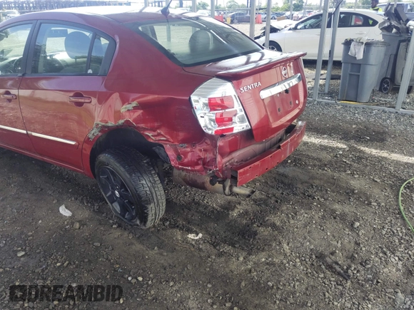 2012 Nissan Sentra 2.0 z VIN 3N1AB6AP9CL713129, wystawiony jako IAAI lot #42309760 z przebiegiem 143 699 mil mil oraz . Historia ofert i sprzedaży dostępna na DreamBid. Obrazek 6.