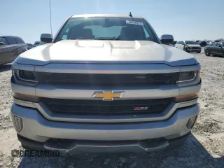 2018 Chevrolet Silverado 1500 LT with VIN 3GCUKREC0JG406702, listed as a Copart auction lot 48888915 with 115,943 mi miles and Salvage Title. Bid and sale history available at carsss.com. Image 5.