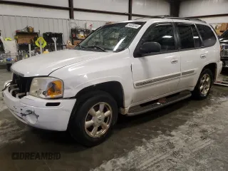 2002 GMC Envoy SLT with VIN 1GKDS13S422437011, listed as a Copart auction lot 84003244 with 182,003 mi miles and Salvage Title. Bid and sale history available at carsss.com. Image 1.