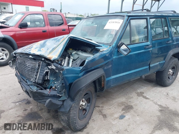 1996 Jeep Cherokee SE z VIN 1J4FJ28S8TL285634, wystawiony jako IAAI lot #42183816 z przebiegiem 260 237 mil mil oraz . Historia ofert i sprzedaży dostępna na DreamBid. Obrazek 6.