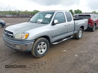2001 Toyota Tundra SR5 with VIN 5TBRT34131S158553, listed as a IAAI auction lot 41999339 with 256,236 mi miles. Bid and sale history available at carsss.com. Image 2.