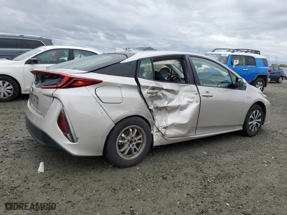 2021 Toyota Prius Prime LE with VIN JTDKAMFP7M3175920, listed as a Copart auction lot 43618755 with 105,228 mi miles and Salvage Title. Bid and sale history available at carsss.com. Image 3.