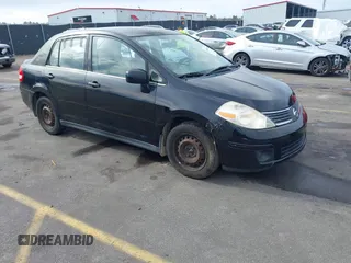 2008 Nissan Versa 1.8 S with VIN 3N1BC11E88L409798, listed as a IAAI auction lot 41460186 with 189,338 mi miles. Bid and sale history available at carsss.com. Image 1.